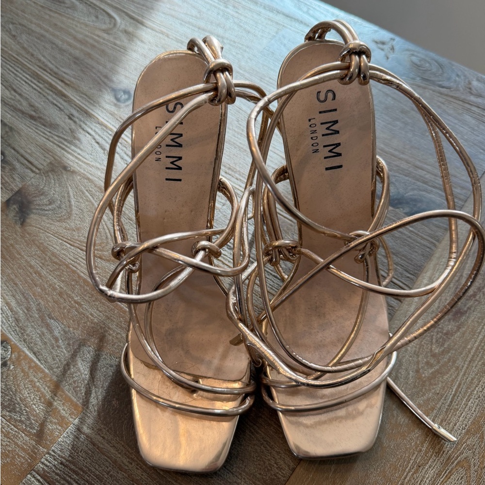 Gold wrap up heels